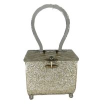 A confetti Lucite purse by Charles S Khan (sticker label has been removed) in gold and pearl shades.