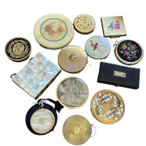 A collection of vintage compacts to include a large Rex 5th Avenue compact c1945, a COTY compact