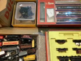 Model Railway interest including track and many rail pieces and large box of trucks and a boxed