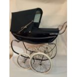 Silver cross Navy Blue Oberon 2005 dolls pram, with the silver cross signature lining-pressed