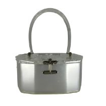 A 1950s Lucite purse by Charles S Kahn of Miami, decagon shaped with a pearl body, reverse carved