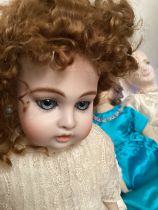 A good selection of Vintage porcelain child toy dolls and cloth and composition dolls with a