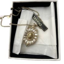 A gold tone Chanel CC necklace from the Autumn 2011 Cruise collection. The pendent is in the style