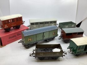 Hornby Model Railway interest to include; a boxed cattle truck, and 6 further wagons  to include a