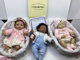 Ashton Drake reborn 11” small real touch baby dolls to include Rosie in bassinet, Deshawn in blue,