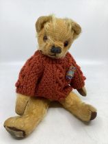 Antique Chad valley 12” golden teddy bear with shield stitch snout and amber glass eyes , and cup