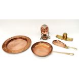 A quantity of copper and brass ware to include an Arts and Crafts charger and a WMF inkstand