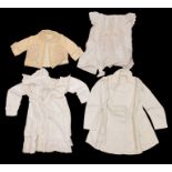 A very large box of children's clothing to include: a slub silk embroidered matinee coat embroidered