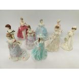 Collection of mostly Royal Worcester and Coalport lady figurines, most with wooden base.