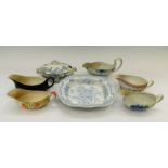 A collection of 19th century blue and white dinner table wares along with a collection of gravy