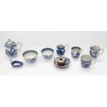 A collection of various blue and white ceramics to include; a small lidded cream jug, a footed cream