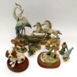 A collection of Capodimonte figures i.e. herons, garden, birds, horses and fly fisherman