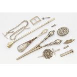 A collection of silver items to include; a Scottish silver kilt pin with distinct Celtic design,