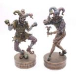 Two resin Jester figures on stands