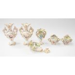 A small collection of 19th Century elaborate porcelain vases and others to include; Two vases with