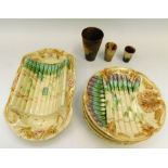 Late 19th century French Majolica style plates and bowl along with horn beakers.
