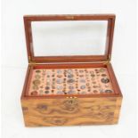 ****WITHDRAWN**** An eclectic collection of buttons kept in a good veneered hardwood display box