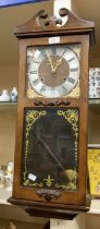 Modern President wall clock contained in a wooden case. Dimensions 28" x 11" x 5" Condition Movement