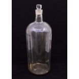A large early 20th Century ribbed glass poison bottle with stopper no damage