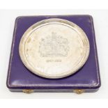 A cased limited edition silver salver commemorating "The Silver Wedding Anniversary of The Queen and