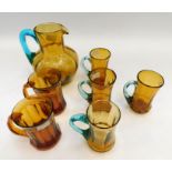 Mid 20th century coloured glass lemonade set of four glasses and a jug, together with two mid 20th