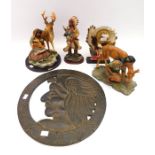 Three Native American resin figures together with an American flag, an eagle mantel clock in resin