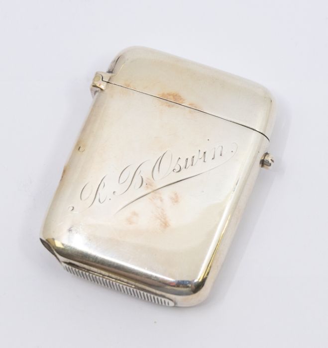 A late Victorian plain silver combination vesta case and cheroot cutter, the hinged cover