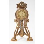 An Art Nouveau gilt metal stylish lady clock, late 19th century (untested)