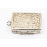 A Victorian silver vinaigrette, profuse engraved scrolling foliate decoration, gilt ornate grille,