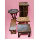 Five small pieces of furniture comprising a late 20th Century revolving bookcase, an Art Deco