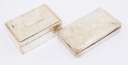 Two early 20th Century silver cigarette boxes, both with fitted interiors, one hallmarked