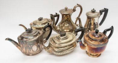 A collection of early 20th century silver plated tea pots, coffee pots, sugar bowls and cream jugs