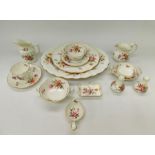 A large collection of Royal Crown Derby 'Posies' pattern ceramics to include; tea cups and