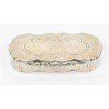 A Victorian silver shaped oblong snuff box, the cover engraved with scrolls and linear decoration,