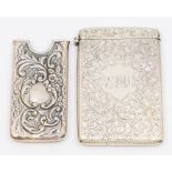 A late Victorian silver profusely engraved card case, hallmarked William Neale, Sheffield, 1897 and