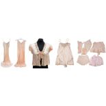 A collection of lingerie, to include: a peach bedjacket, 1940s, edged in marabou; peach velvet