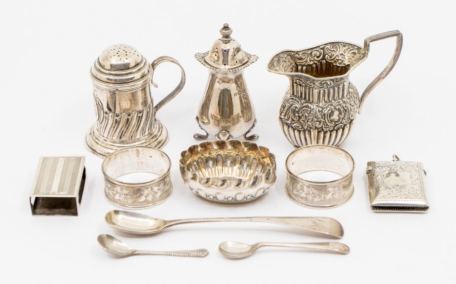 A collection of silver to include: a Charles Stuart Harris Victorian silver handled footed salt