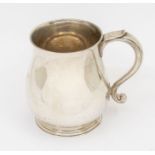 A George V silver baluster mug, C-scroll handle, the body engraved with initials, hallmarked by