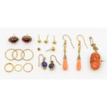 A collection 19th century and later jewellery to include a carved coral cameo brooch depicting a