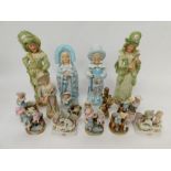 A collection of early 20th century German mantel spill and bisque figures of children and a pair