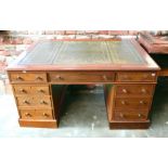 A re-conditioned mahogany Edwardian partners desk by W Priest of Blackfriars, on two pedestals,