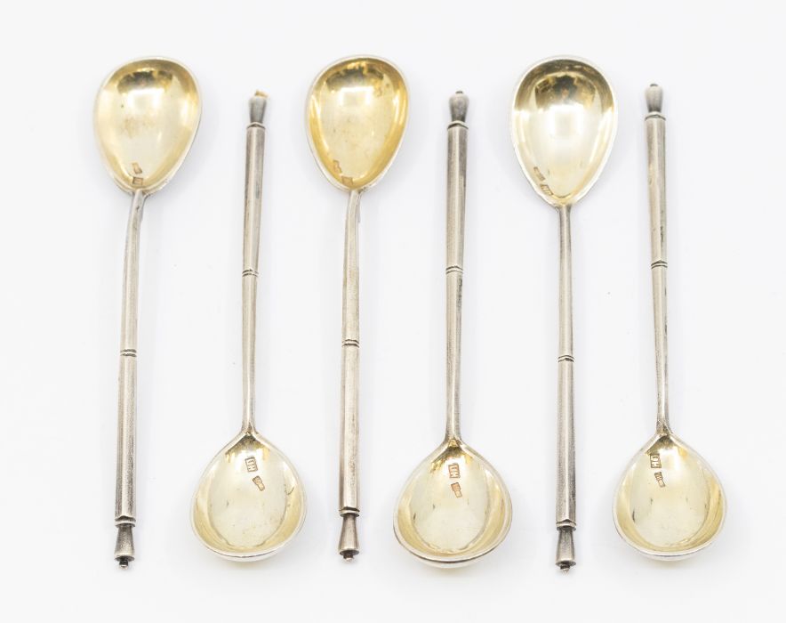 A set of six early 20th Century Russian 84 Kokoshnik standard silver egg spoons, the gilt bowls with