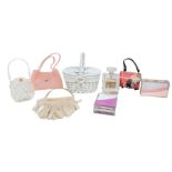 A collection of bags including: a white wicker basket with two lids; and a collection of Perspex