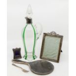 A collection of silver to include: an Art Nouveau silver mounted glass ewer and stopper, with