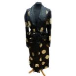 A mans Chinese black satin robe, size 44, the garment is embellished with character marks in gold,