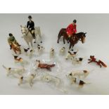 Beswick - A Hunting set consisting of both male and female riders on horseback, child on