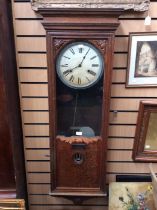 A Bland wall clocking in clock or Industrial Time Recorder. Contained in an oak case. With