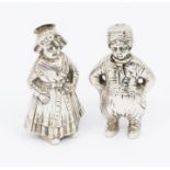 A pair of Continental 830 standard silver probably Dutch novelty figural pepper pots cast in the