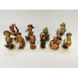 Goebel/MJ Hummel - A collection of various figurines, all children to include; Little Hiker,