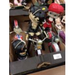 Three Betty Boop sitting on vintage motorcycle figures.